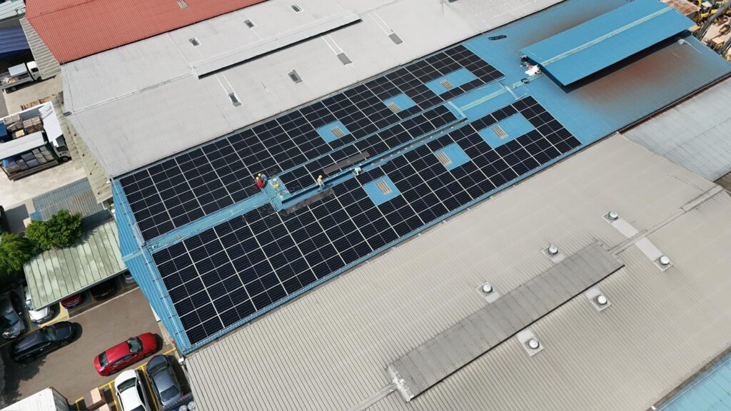 Industrial solar panel installation in Singapore with 180.7kWp rooftop system on factory building reducing electricity costs